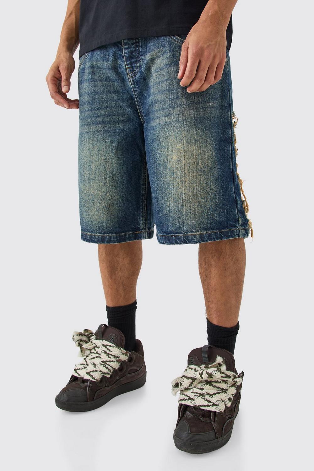 RELAXED RIGID EXTREME RIPPED DENIM JORTS IN ANTIQUE BLUE